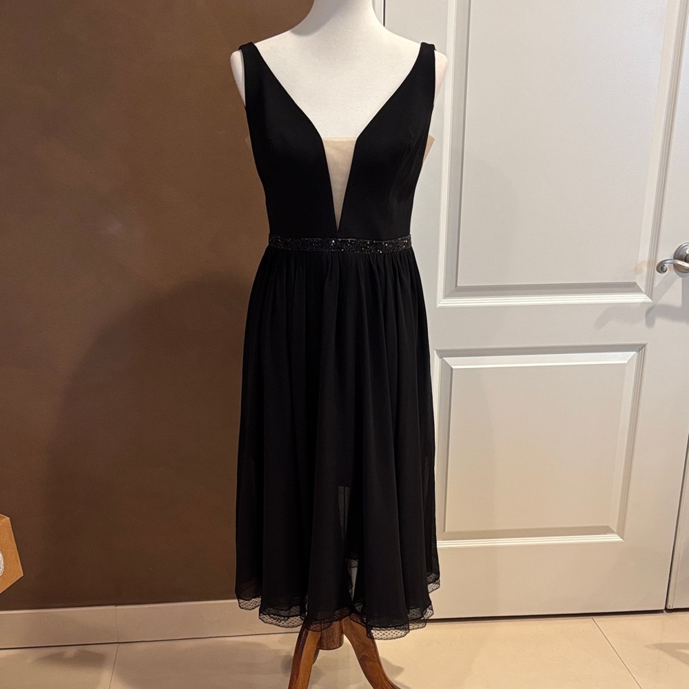 Elegant Black Midi Dress with Plunging Neckline
